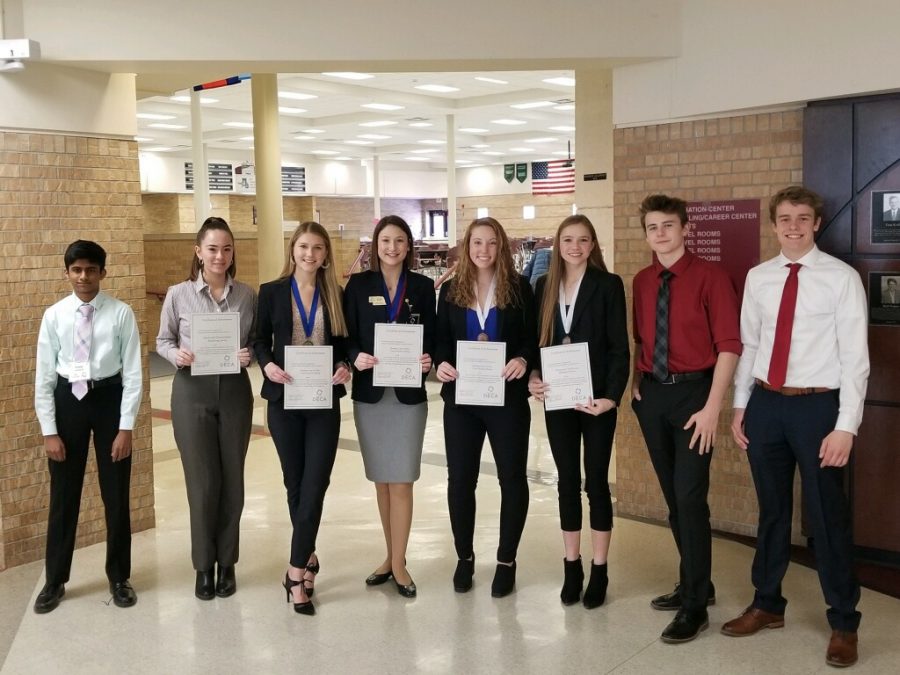 Elkhorn South students pose with awards from DECA Metros, held at Millard South on Jan. 16.