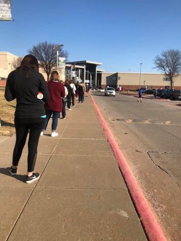 Teachers line up outside of Millard North High School prior to their 9am appointments. Photo credit by Kayla Anderson